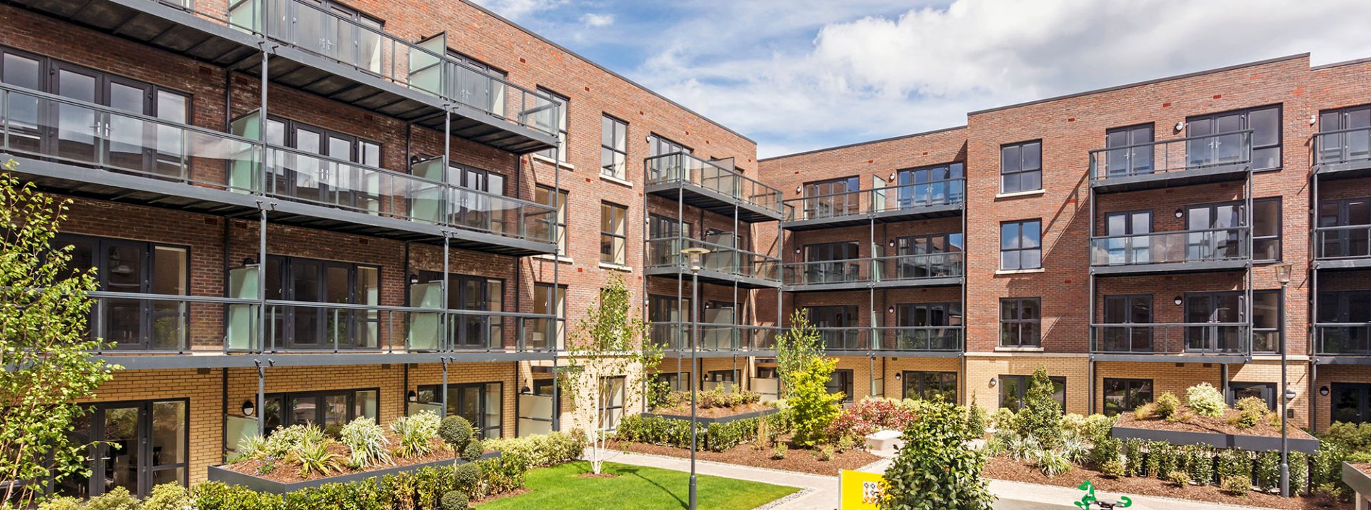 Occu Abbot exterior showing courtyard and green space